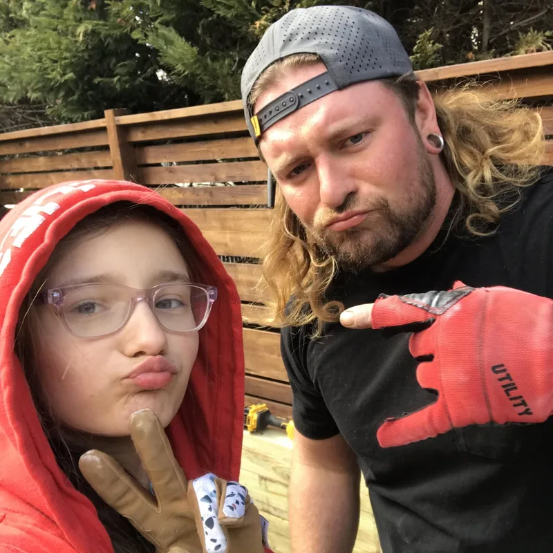 AJ of AJ Builders LLC on a recent deck build with his daughter